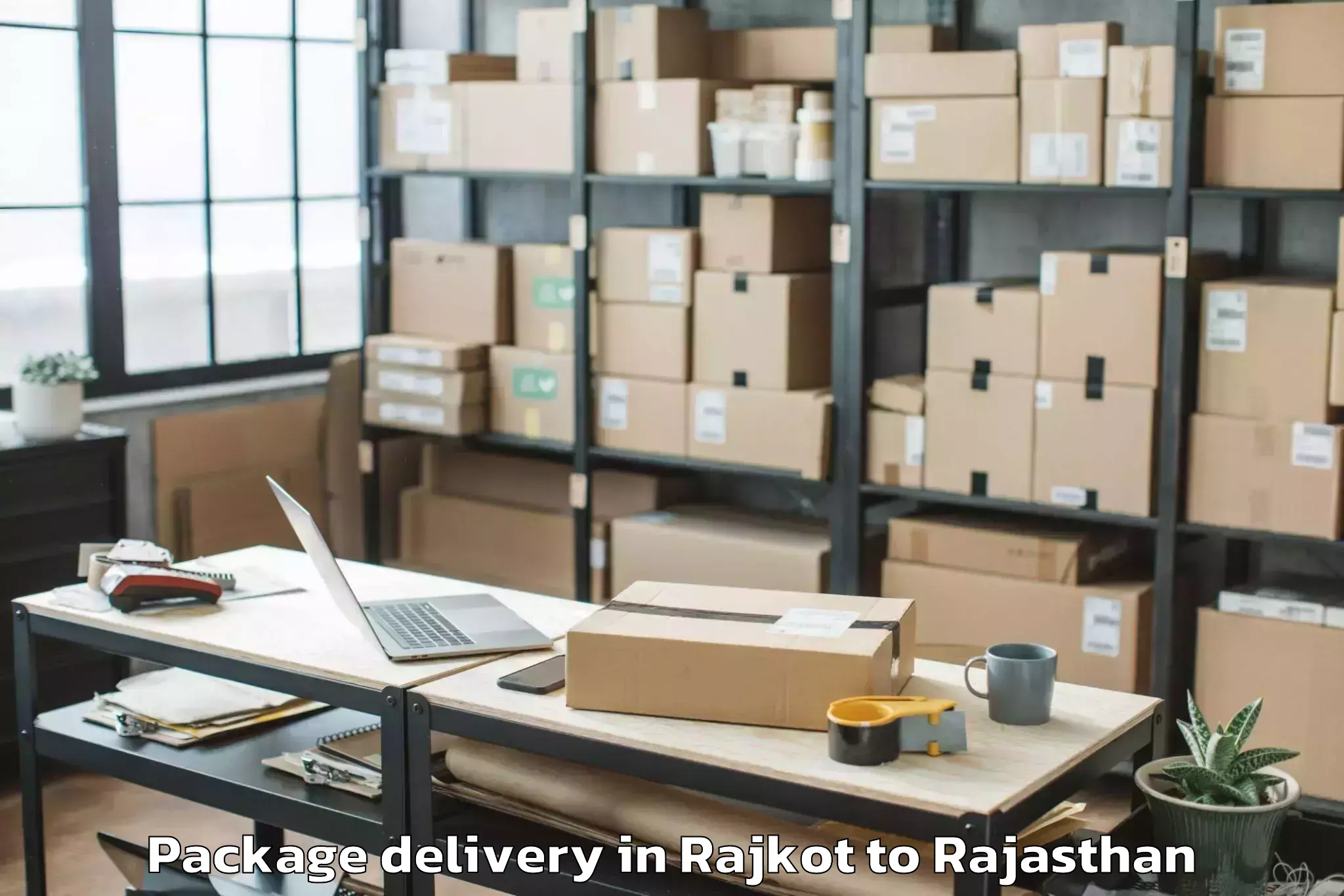 Top Rajkot to Niwai Package Delivery Available